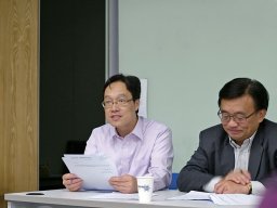 Dr Aaron Chiang Hon Treasurer answering a query